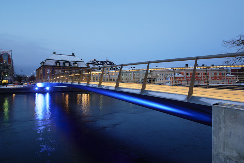 snow free pedestrian bridge by erik andersson architects