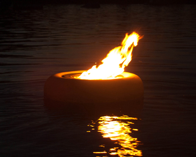 AB concrete design's glowing flambeaus that floats in water 
