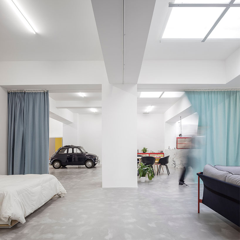 fala atelier transforms windowless garage in lisbon into a cosy + characterful home - 1
