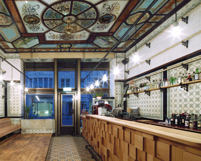 michael grzesiak transforms a century old butcher shop into a bar