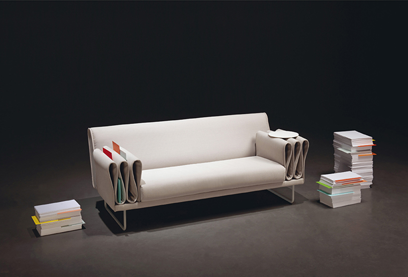tri-folds sofa by camille paillard uses arm rest for storage