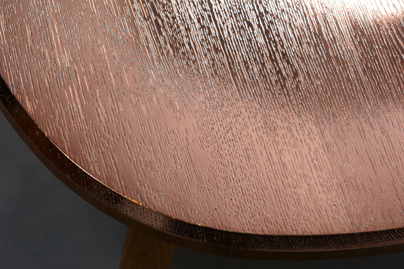 kenji fukushima design coats mirror table with reflective silver surface