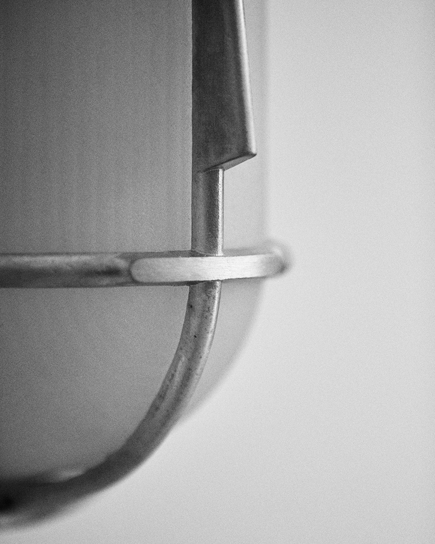 philippe tabet reimagines industrial bulkhead lamp as face-like lighting fixture