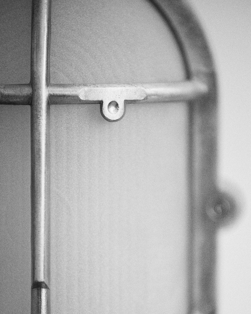 philippe tabet reimagines industrial bulkhead lamp as face-like lighting fixture