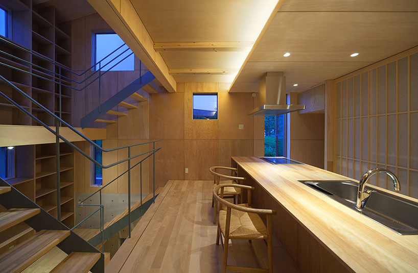 movedesign: house in nanakuma features layered staircase