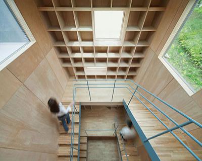 movedesign: house in nanakuma features layered staircase