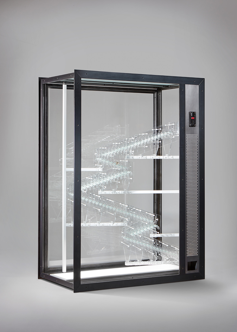 jelle mastenbroek's glassworks vending machine plays on monetary value