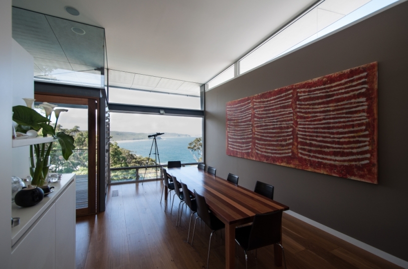 bourne blue architecture divides dudley residence along cliff