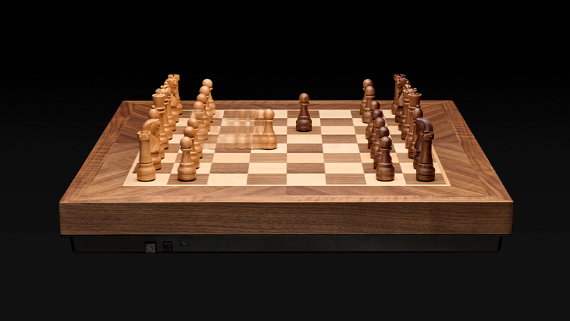 crafted in solid walnut and maple, phantom is the world&rsquo;s first robotic chessboard