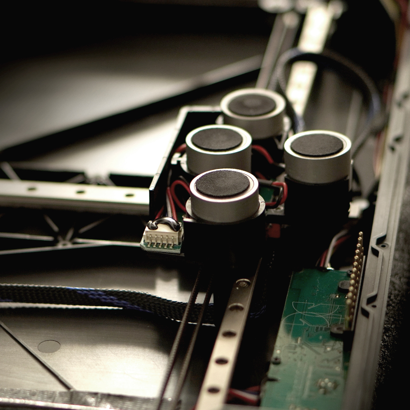 crafted in solid walnut and maple, phantom is the world&rsquo;s first robotic chessboard