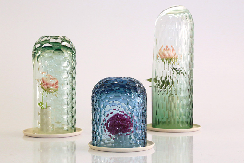 OP-vase by bilge nur saltik multiplies + reflects flower formations