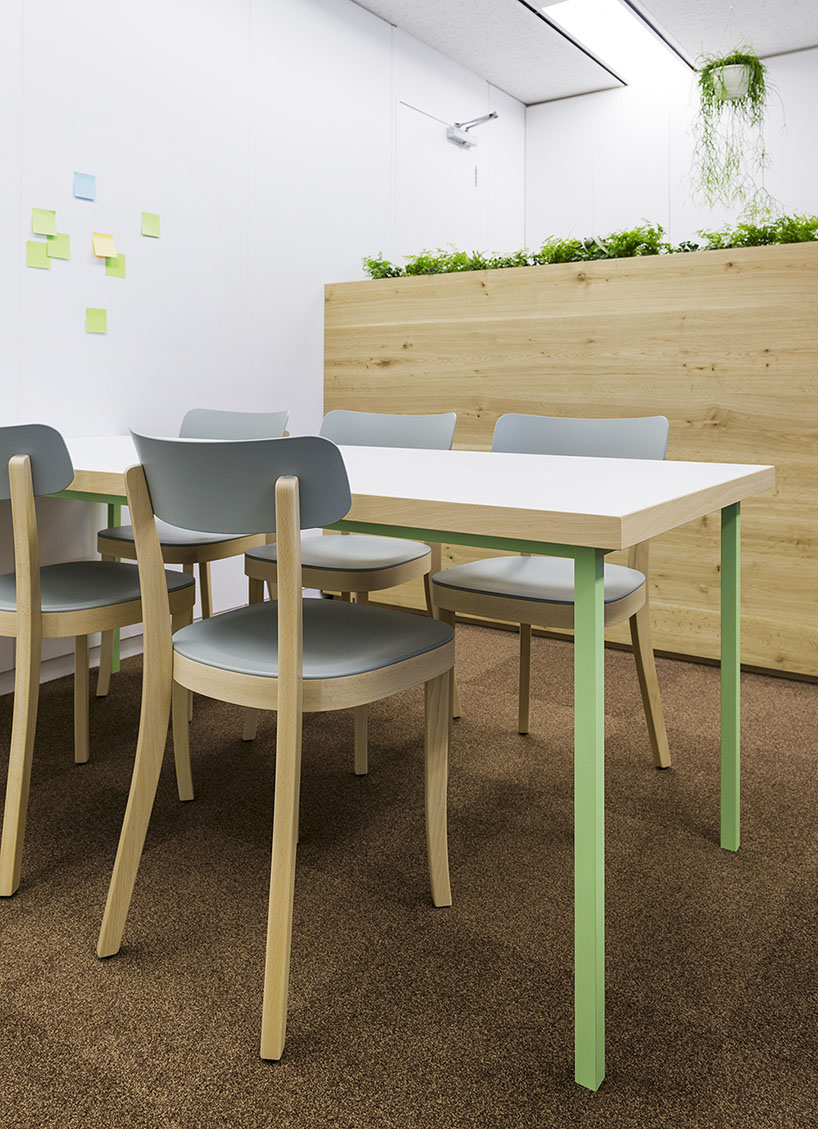 naoya matsumoto inserts soothing plants into koshida clinic in osaka