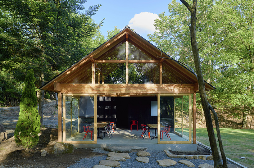 mori no terrace designs a subtle cafe amongst a luscious green campsite in osaka