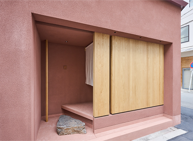 naoya matsumoto imbues earthy tones into the interior of isai restaurant in osaka