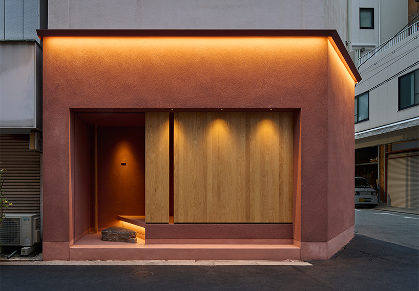 naoya matsumoto imbues earthy tones into the interior of isai restaurant in osaka