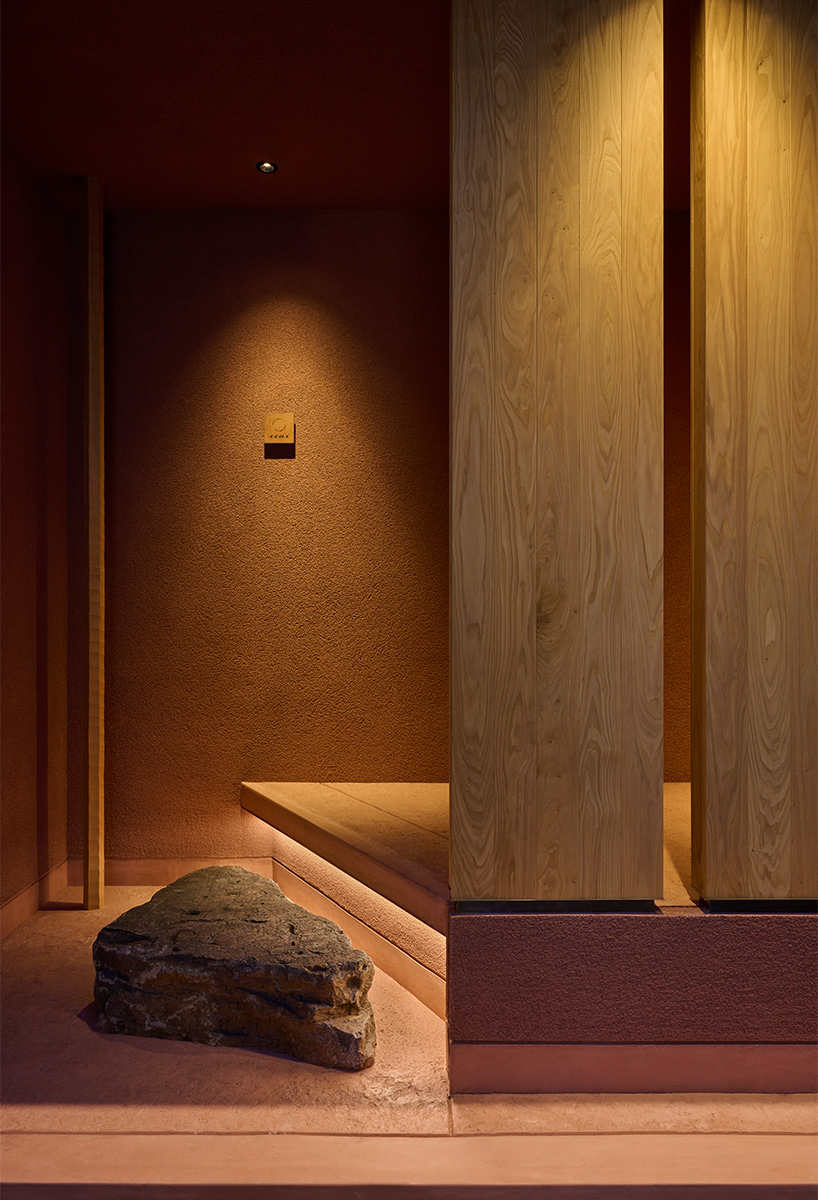 naoya matsumoto imbues earthy tones into the interior of isai restaurant in osaka