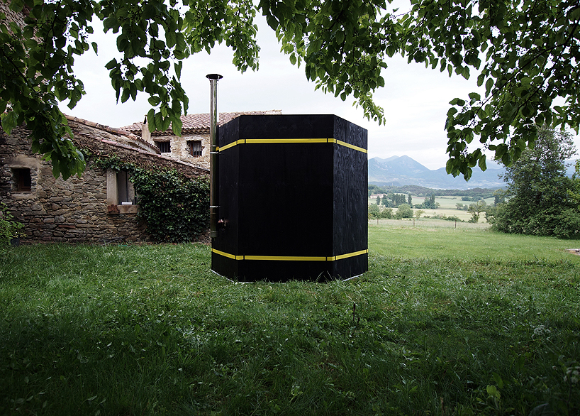 archiplein assembles mobile sauna into hexagonal shape