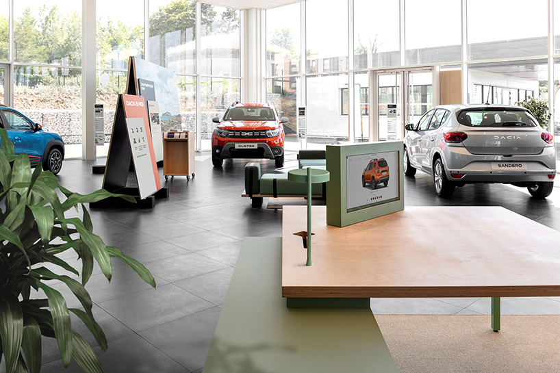 studio 5•5’s eco-friendly car showroom sets flexible furniture on recycled tire bricks