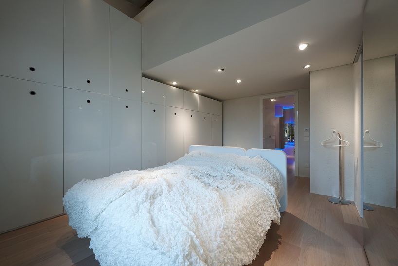 simone micheli enlivens futuristic mirrored house in florence