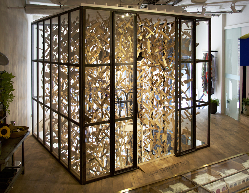 samuel wilkinson suspends brace chair and offcuts inside cube