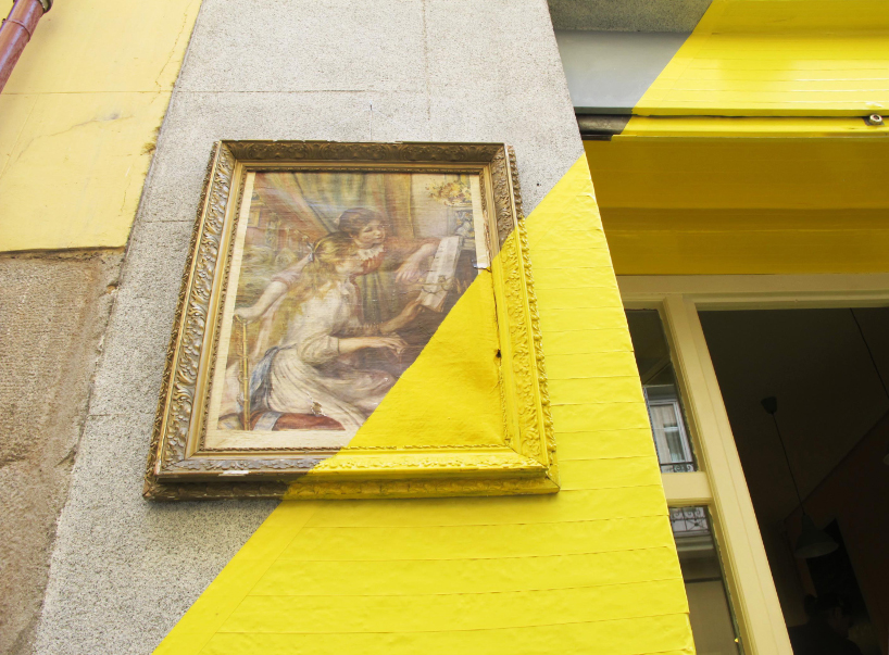 (fos) paints light onto a grey street