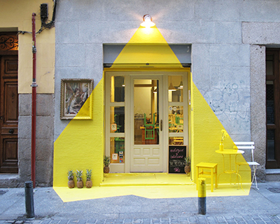 (fos) paints light onto a grey street