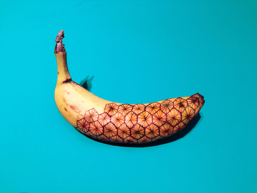 marta grossi inscribes onto temporary canvas for banana graffiti 
