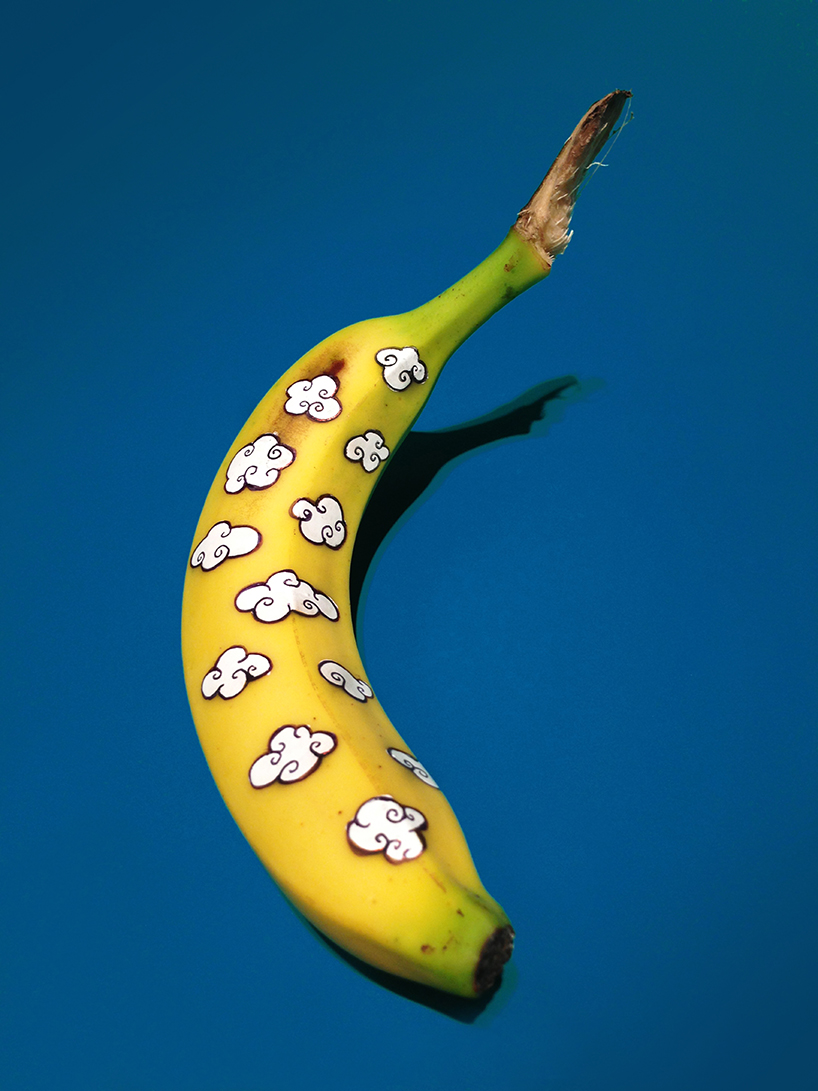 marta grossi inscribes onto temporary canvas for banana graffiti 