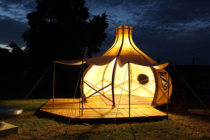 giant grass creates froute pod for glamorous camping