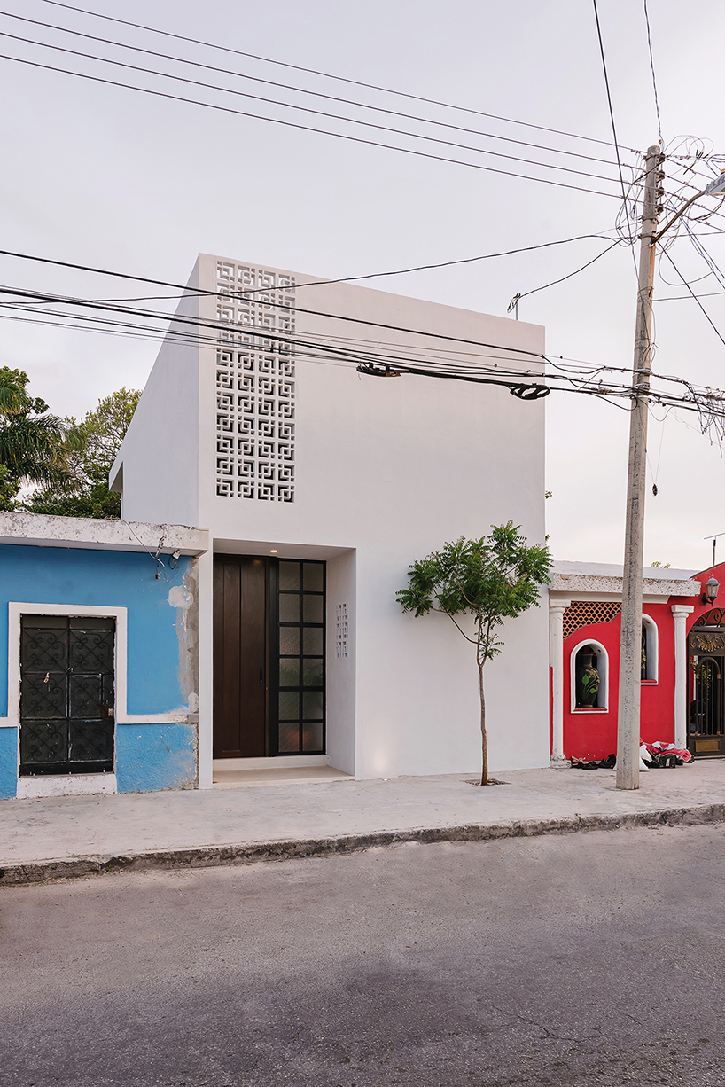 stone lattice facade clads tropical vacation house by workshop in mexico
