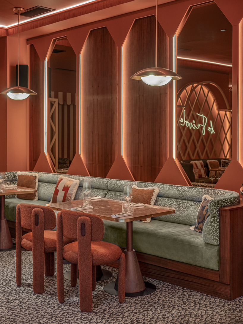 vibrant fabrics ornament restaurant interiors by maison malapert in paris fashion district