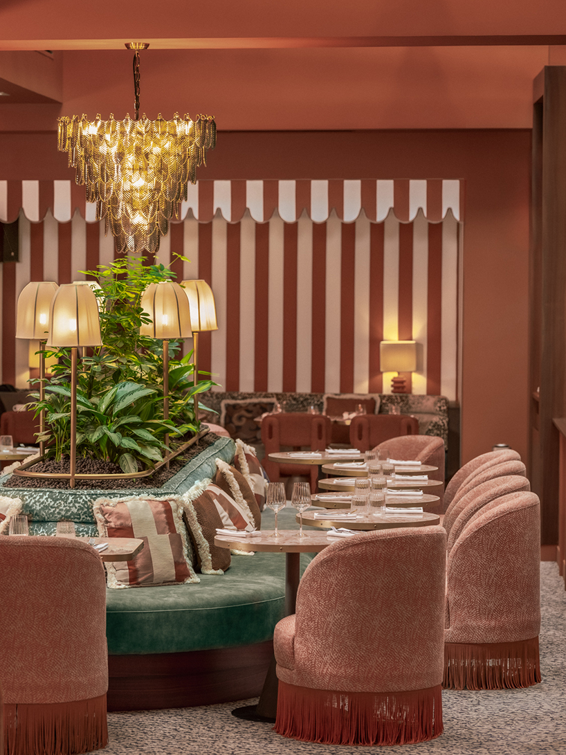 vibrant fabrics ornament restaurant interiors by maison malapert in paris fashion district