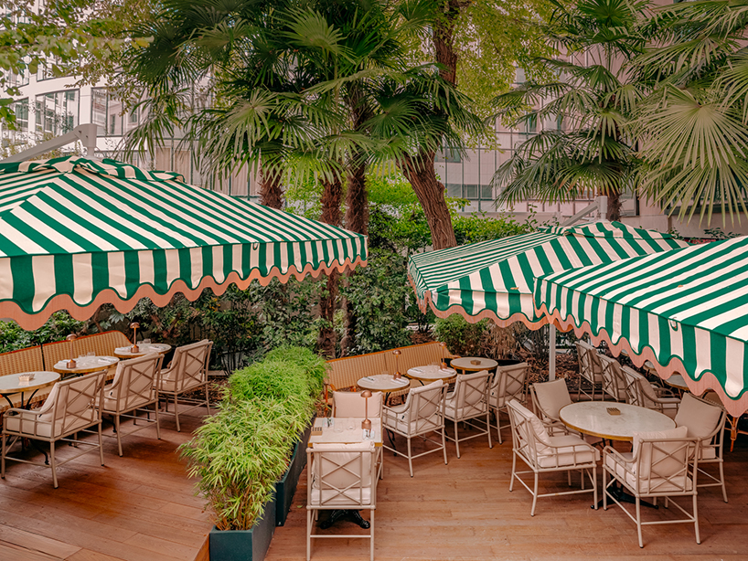vibrant fabrics ornament restaurant interiors by maison malapert in paris fashion district