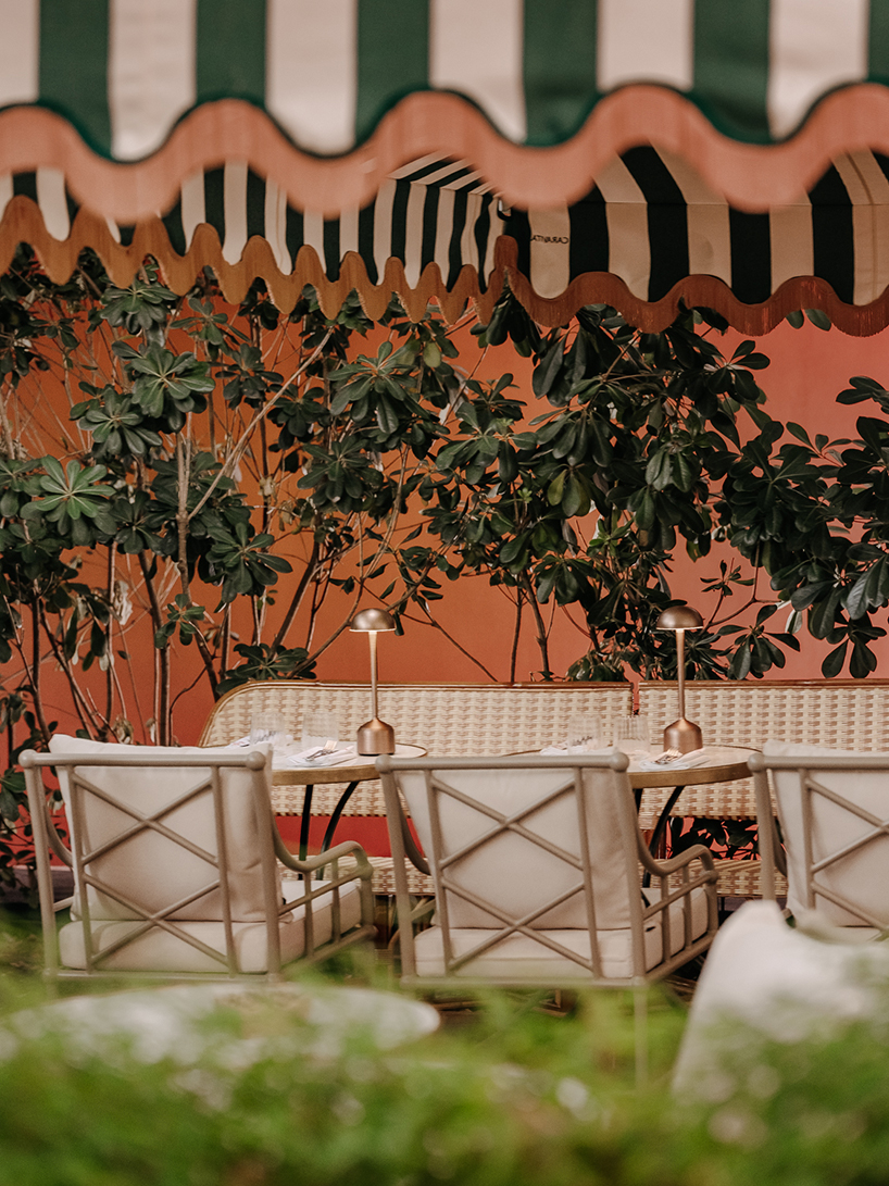 vibrant fabrics ornament restaurant interiors by maison malapert in paris fashion district