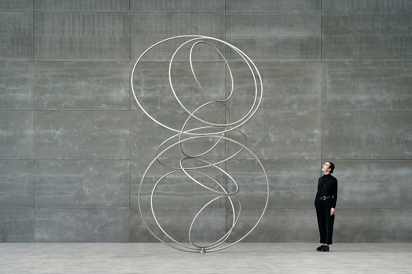 nine steel rings continuously rotate in cycles for SpY's form-bending kinetic sculpture