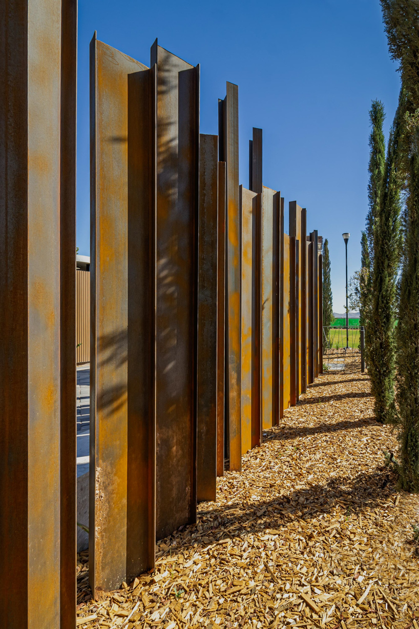 house-like concrete play structures frame community arc park in chihuahua - 9