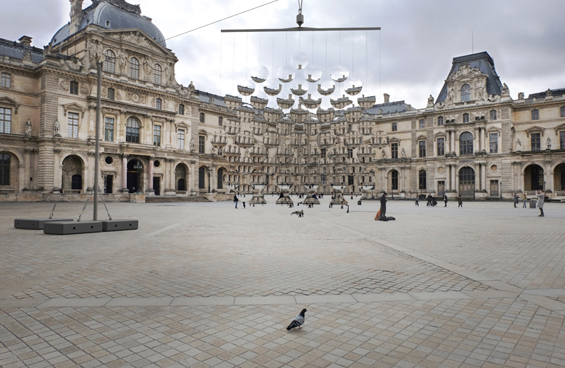 vincent leroy envisions distorting lens installation in front of the louvre