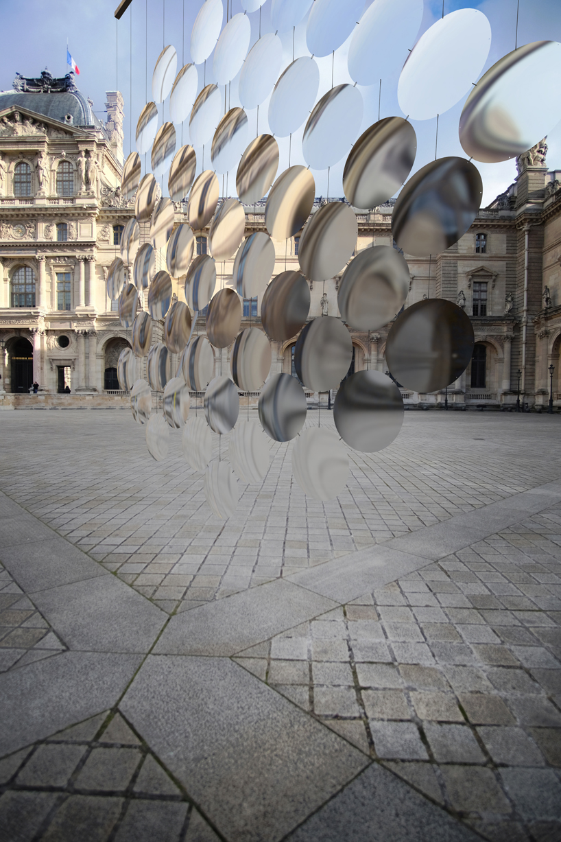 vincent leroy envisions distorting lens installation in front of the louvre