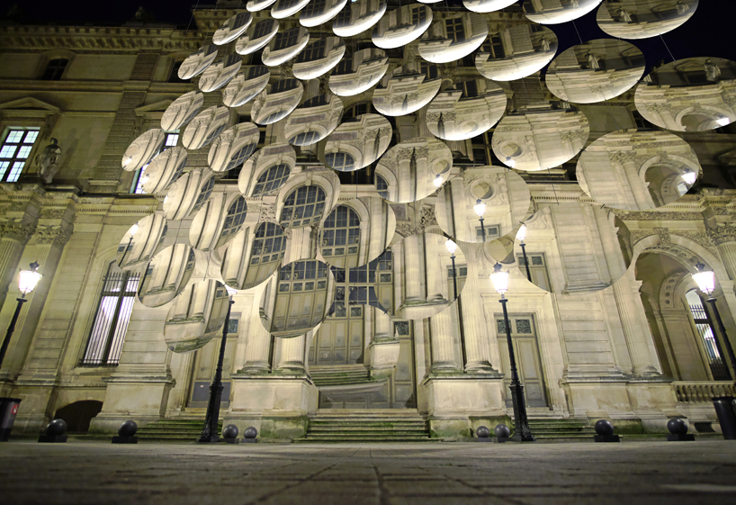 vincent leroy envisions distorting lens installation in front of the louvre