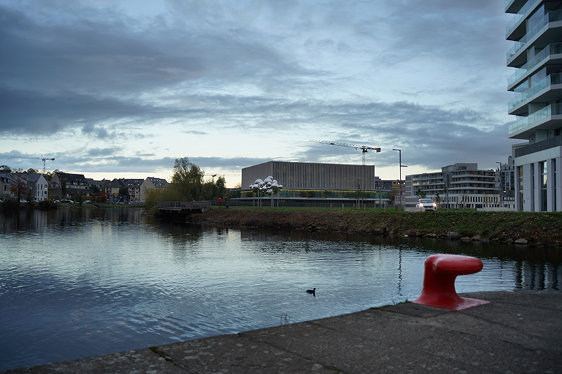 mirrored steel bubbles shape suspended kinetic sculpture by vincent leroy in normandy