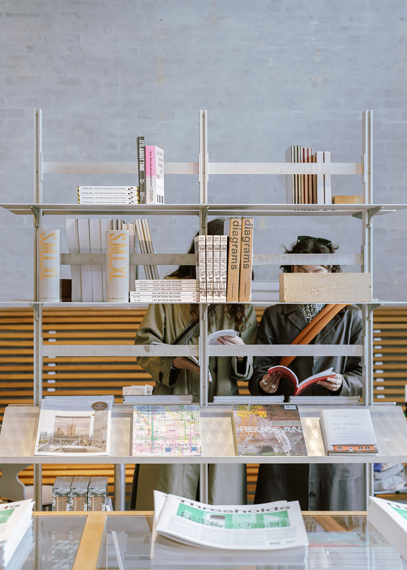 a bookstore inside cobe copenhagen: a material library of architecture, cities, and ideas - 5