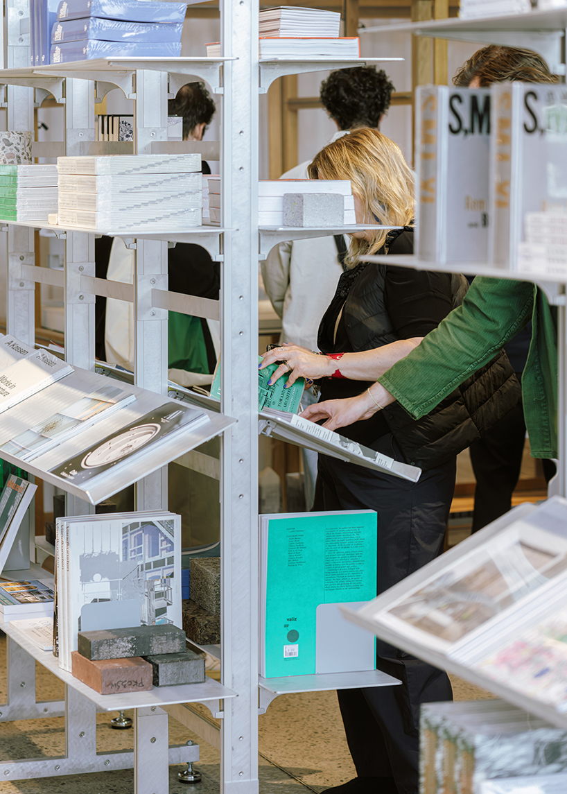 a bookstore inside cobe copenhagen: a material library of architecture, cities, and ideas - 6
