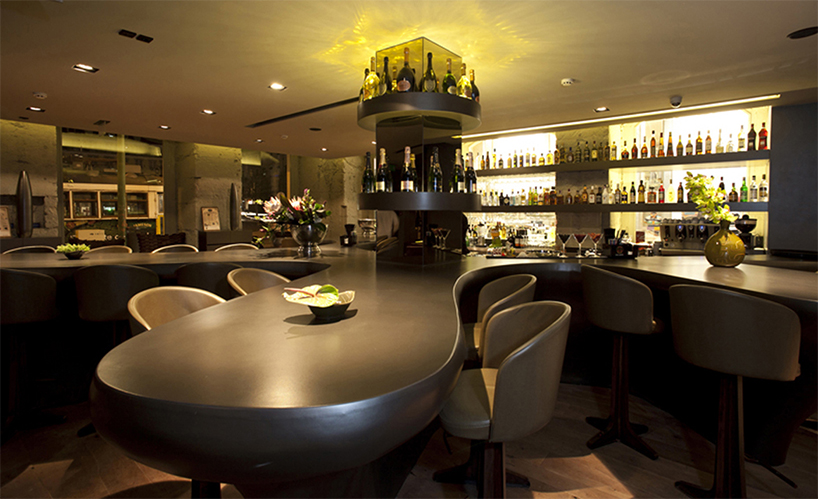 nini andrade silva inserts tree trunk in beautique hotels figueira