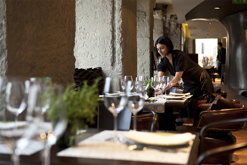 nini andrade silva inserts tree trunk in beautique hotels figueira