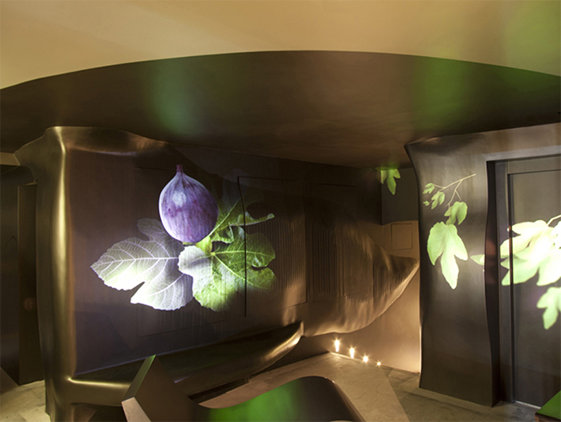 nini andrade silva inserts tree trunk in beautique hotels figueira