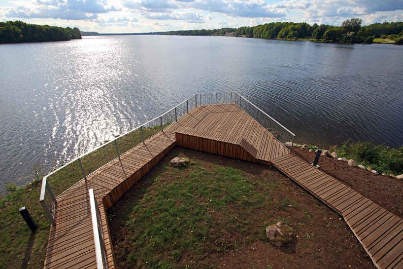 view terrace + pavilion merges with the garden of destiny in latvia