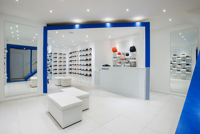 miklós kiss encases budapest footwear store in brilliant white metro tiles