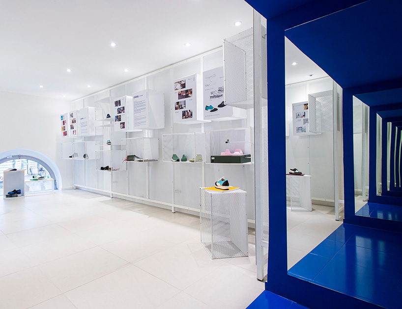 miklós kiss encases budapest footwear store in brilliant white metro tiles