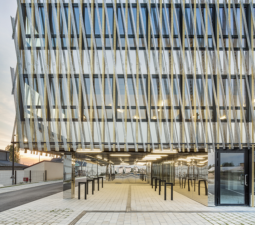 périphériques marin+trottin architectes shapes space with sunlight for offices in laval, france