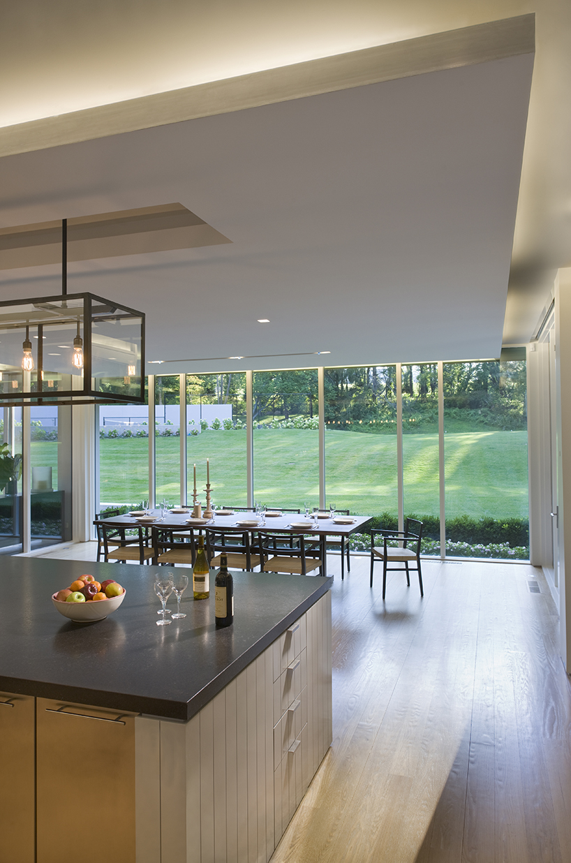 joeb moore + partners slices gable-roofed house